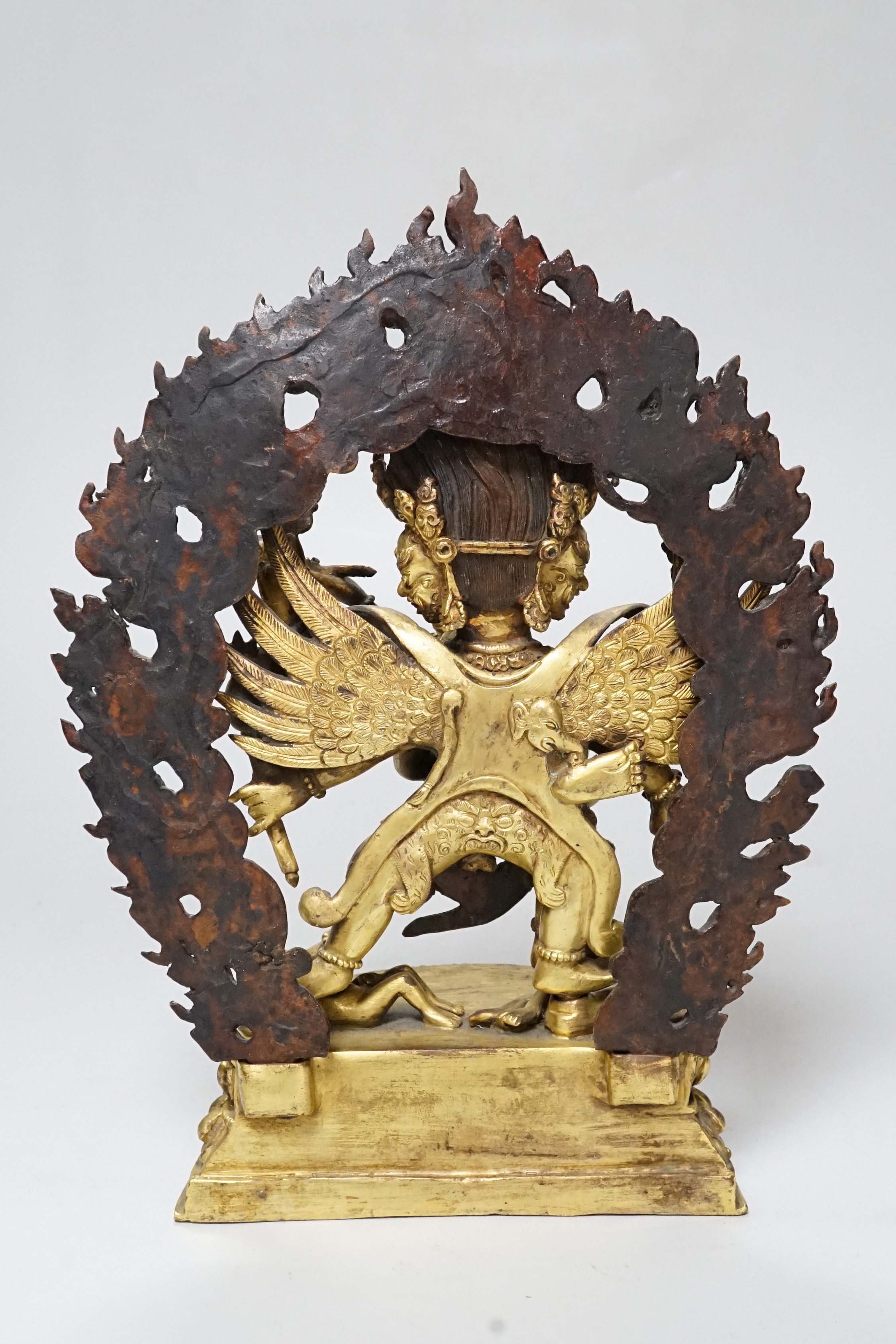 A Sino Tibetan gilt bronze group of Mahakala and consort, 22cm